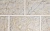 Цокольная фасадная плитка керамическая облицовочная под камень ADW Симферополь серо-бежевая 300*150*8 мм